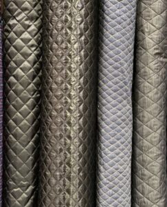 rolls of quilted batting fabric